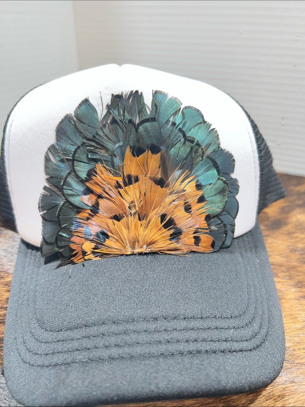 Black & White Trucker Hat with Turquoise Feather Embroidery. $45 retail!!